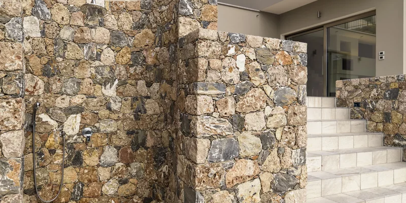 brick-shower-in-the-garden-near-the-staircase-2026-03-17-21-44-17-utc-petite